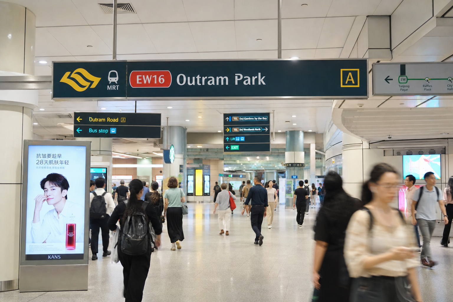 Outram Park MRT interchange concourse with commuters passing through